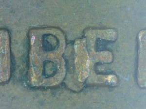 1927 wheat penny die crack error showing raised lines on coin surface including BIE variety between B and E in LIBERTY